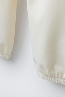 PANTAL?N JOGGER FLUIDO / Crudo