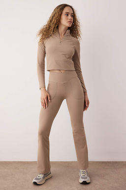 Siyah Soft F?rcal? Kumas Kruvaze Bel ve Cep Detayl? Ispanyol Paca Yoga Orme Spor Tayt THMAW26TY00000 - Trendyolmilla фото 5