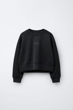 SWEATSHIRT WITH RAISED SLOGAN