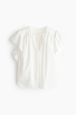 Blusa de manga circular con ribete de encaje