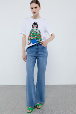 Светло-синие джинсы-клеш