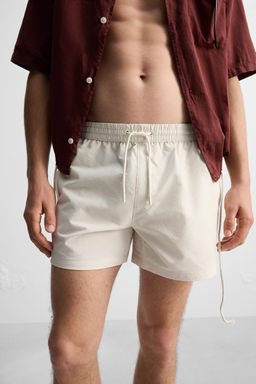 REGULAR SEERSUCKER SWIMMING TRUNKS - Zara фото 6