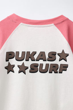 CAMISETA MANGA RANGL?N PUKAS SURF / Rosa / Blanco