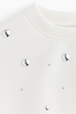 Sudadera efecto neopreno con tachuelas - H&m фото 6