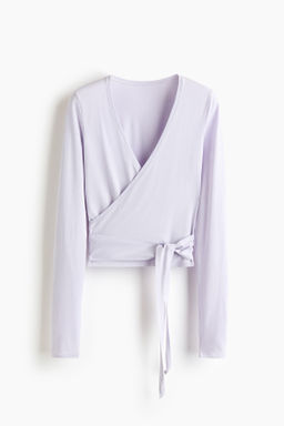 Top de deporte cruzado en modal - H&m фото 9