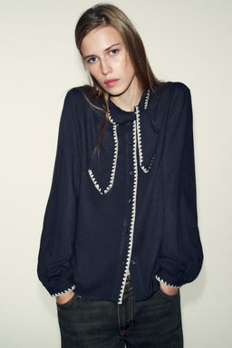 BLOUSE WITH TIE AND CONTRAST TOPSTITCHING