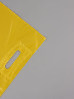 Цена за 50 шт. Пакет полиэтиленовый с вырубной ручкой, жёлтый 30×40 см, 50 мкм
