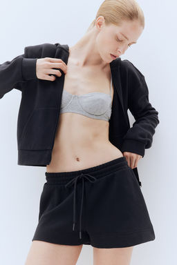 Chaqueta sudadera gofrada con capucha y cremallera