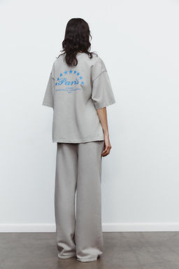 WASHED EFFECT PLUSH TROUSERS WITH TEXT - Zara фото 7