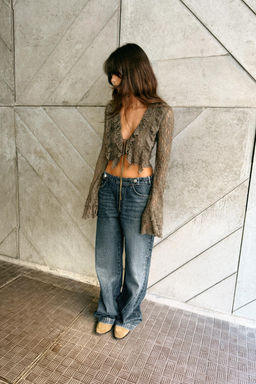 SHORT LACE JACKET WITH RUFFLES