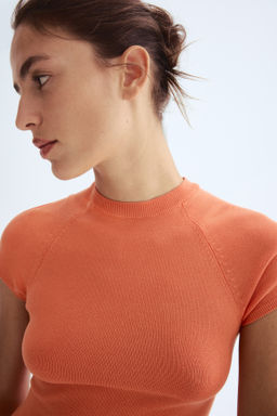 Top en punto fino con peplum - H&m фото 7