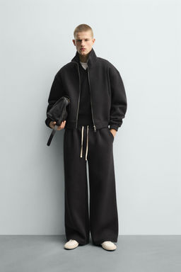 CAZADORA T?CNICA CROPPED FIT / Negro