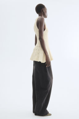 Top en punto pointelle con peplum - H&m фото 3