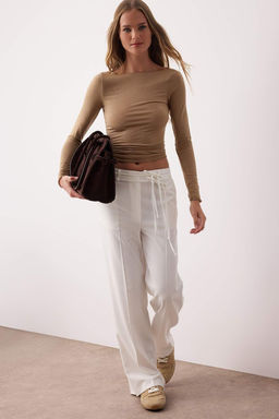 Beyaz Bagc?k Detayl? Dusuk Bel Wide Leg/Genis Paca Pantolon TWOAW26PL00008