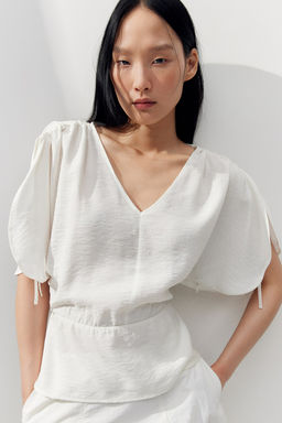 Blusa con cordon de ajuste