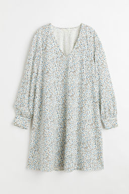 Vestido con escote de pico
