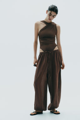 DRAPED ASYMMETRIC TULLE BODYSUIT