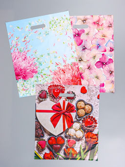 Цена за 50 шт. Ассорти подарочных пакетов полиэтиленовых с вырубной ручкой, 38?45 + 3 см, 50 мкм