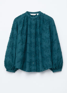 Blusa voluminosa con apliques florales