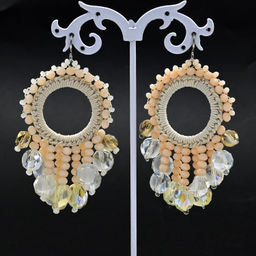 Серьги ручной работы с цирконами в оплетении цв.молочный