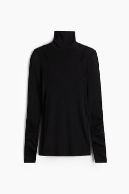 Top de lana merino con cuello perkins