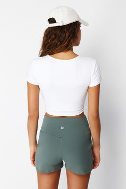 Trendyolmilla Beyaz 2 Katl? Ici Pedli Spor Sutyenli Crop Orme Spor Ust/Bluz THMSS24BZ00003