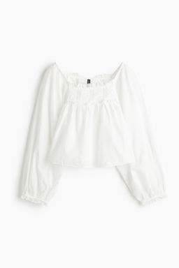Blusa de algod?n con ribetes de encaje