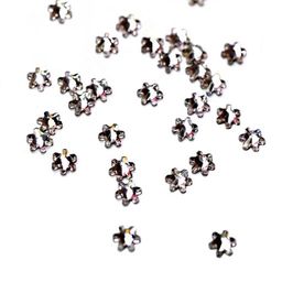 Стразы фигурные Снежинка прозрачные 4 мм