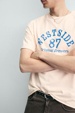 CAMISETA RELAXED FIT TEXTO LAVADO / Blanco