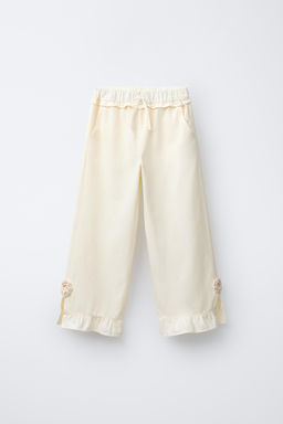 CROCHET FLOWER RUFFLE WIDE-LEG TROUSERS