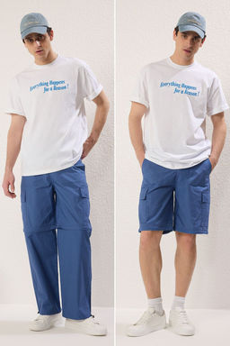 TRENDYOL MAN Lacivert Straight Kal?p Parasut Kumas Fermuarl? Sort Olabilen Pantolon TMNSS25PL00014