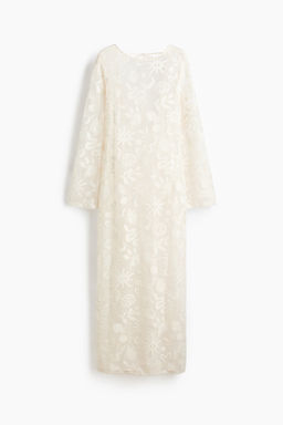 Vestido de rejilla con motivos decorativos