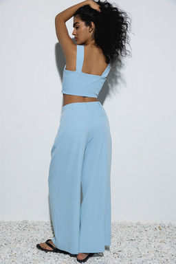 Светло-голубые классические брюки