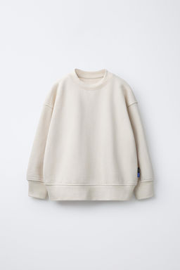 SUDADERA B?SICA TEXTO Y ETIQUETA / Crudo