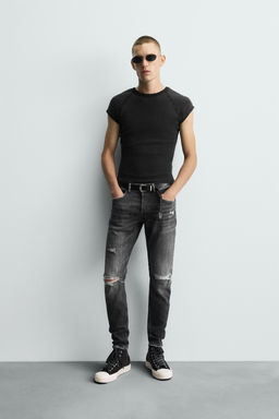 JEANS SKINNY FIT ROTOS / Gris