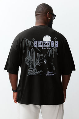 Siyah Oversize/Geni_ Kesim Bisiklet Yaka K_sa Kol S_rt Bask_l_B_y_k Beden T-Shirt TMNSS25BF00003
