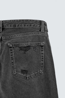 RIPPED BELL BOTTOM FIT JEANS