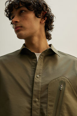 Camisa deportiva zip-off en DryMove Loose Fit