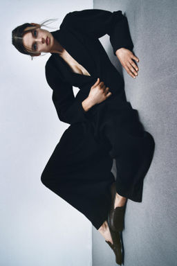 LEATHER LOAFERS WITH BUTTON DETAIL