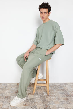 Mint Oversize/Genis Kesim Dokulu Genis Paca Etiketli Bol Esofman Alt? TMNSS24EA00005