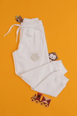 Кремовые спортивные штаны для мальчиков Неожиданная скидка в корзине