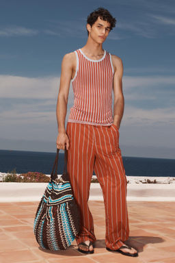LIMITED EDITION STRIPED RELAXED FIT TROUSERS