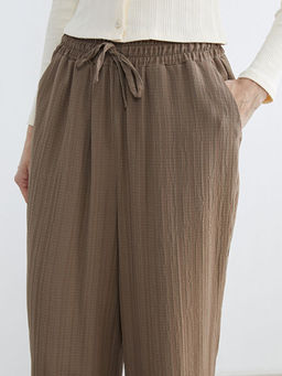 Beli Lastikli Dokulu Kad?n Pantolon