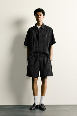 BERMUDA RELAXED FIT RELIEVE / Negro