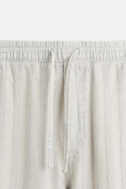 RELAXED FIT JACQUARD TROUSERS - Zara фото 19
