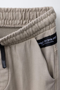 JOGGER TROUSERS WITH ZIPS - Zara фото 3