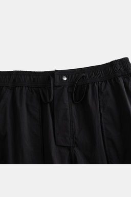Брюки текстильные Черный ANTA ICONIC Woven Track Pants  фото 3