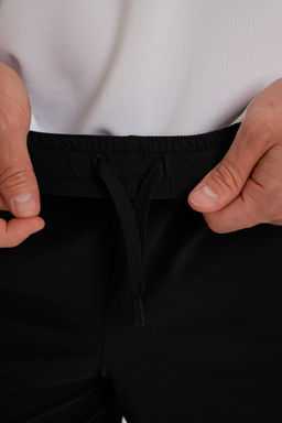 Шорты трикотажные Черный ANTA TRN-ESSENTIAL Knit Half Pants фото 6