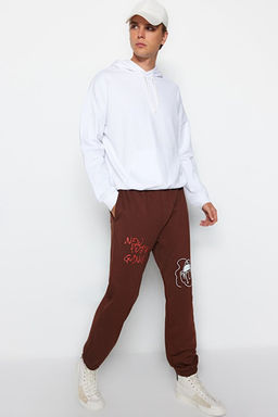 Kahverengi Oversize/Geni_ Kesim Yaz_ Bask_l_ Pa_as_ Lastikli Jogger Bol E_ofman Alt_ TMNSS22EA0119