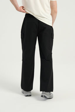 Брюки текстильные Черный CAMPING Woven Track Pants - Anta фото 4